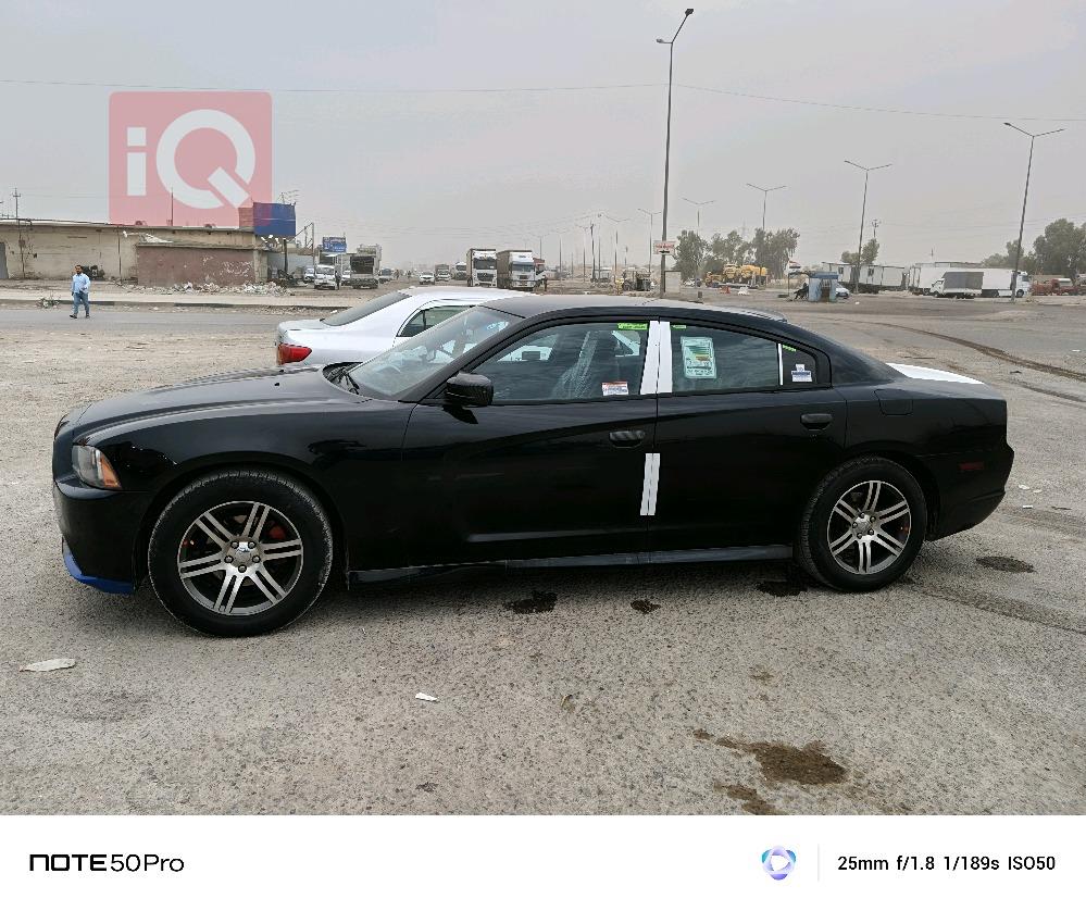 دۆج چارجەر